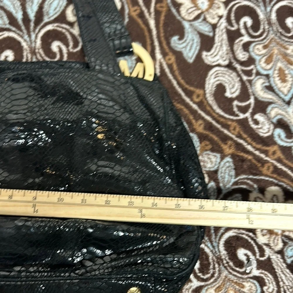 Michael Kors Black Hobo Bag with Gold Emblem